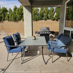 Patio Table Set with Charbroil BBQ pit included.