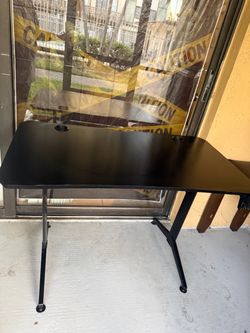 Pink gaming chair with desk