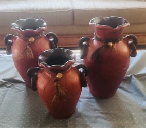 3 terracotta vases