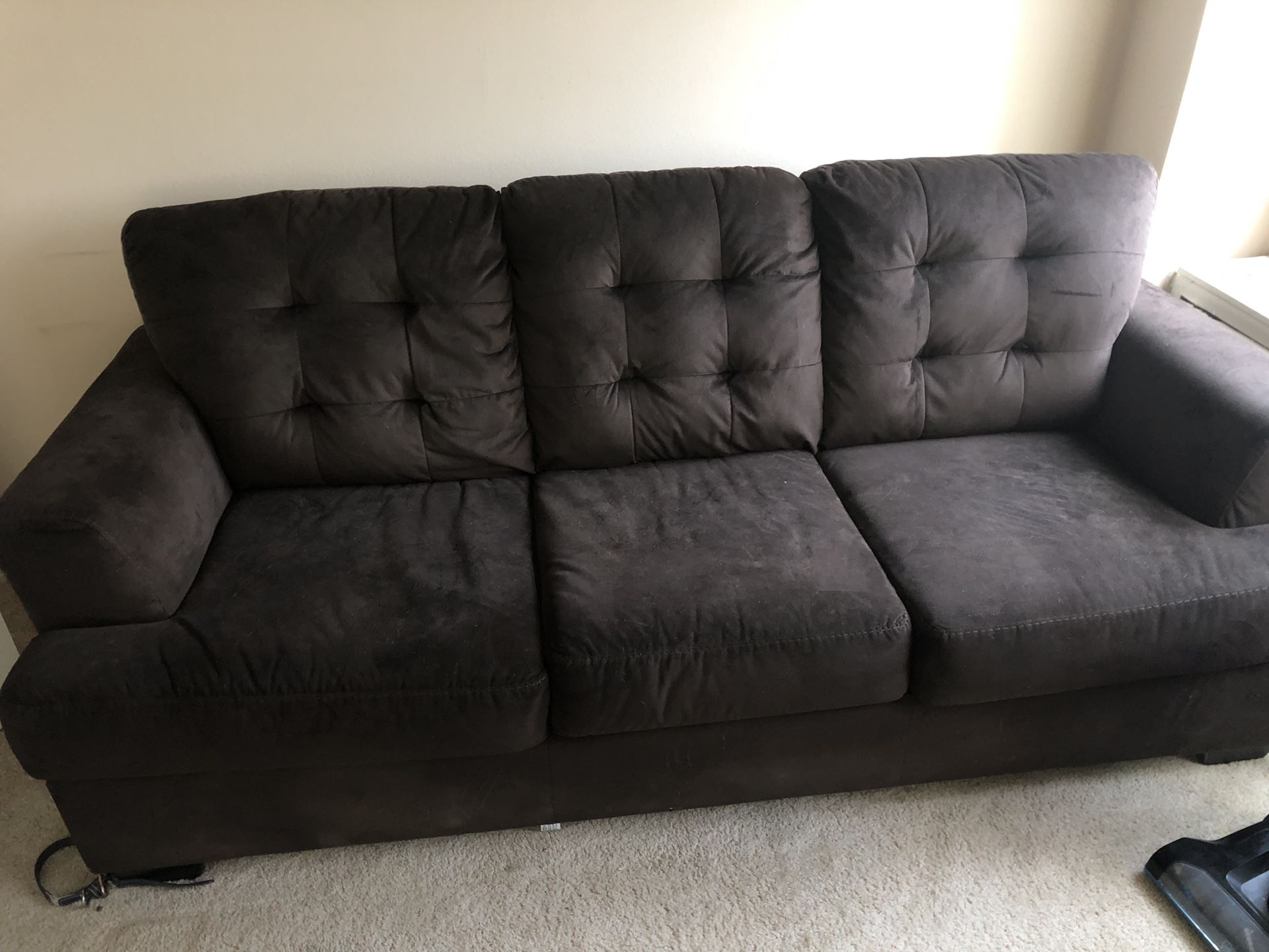 Brown 3 seat couch with new bed inside