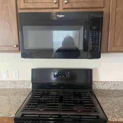 Black Whirlpool Stove Oven Combo, Microwave, And Dishwasher