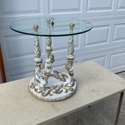 Three post glass cherub table