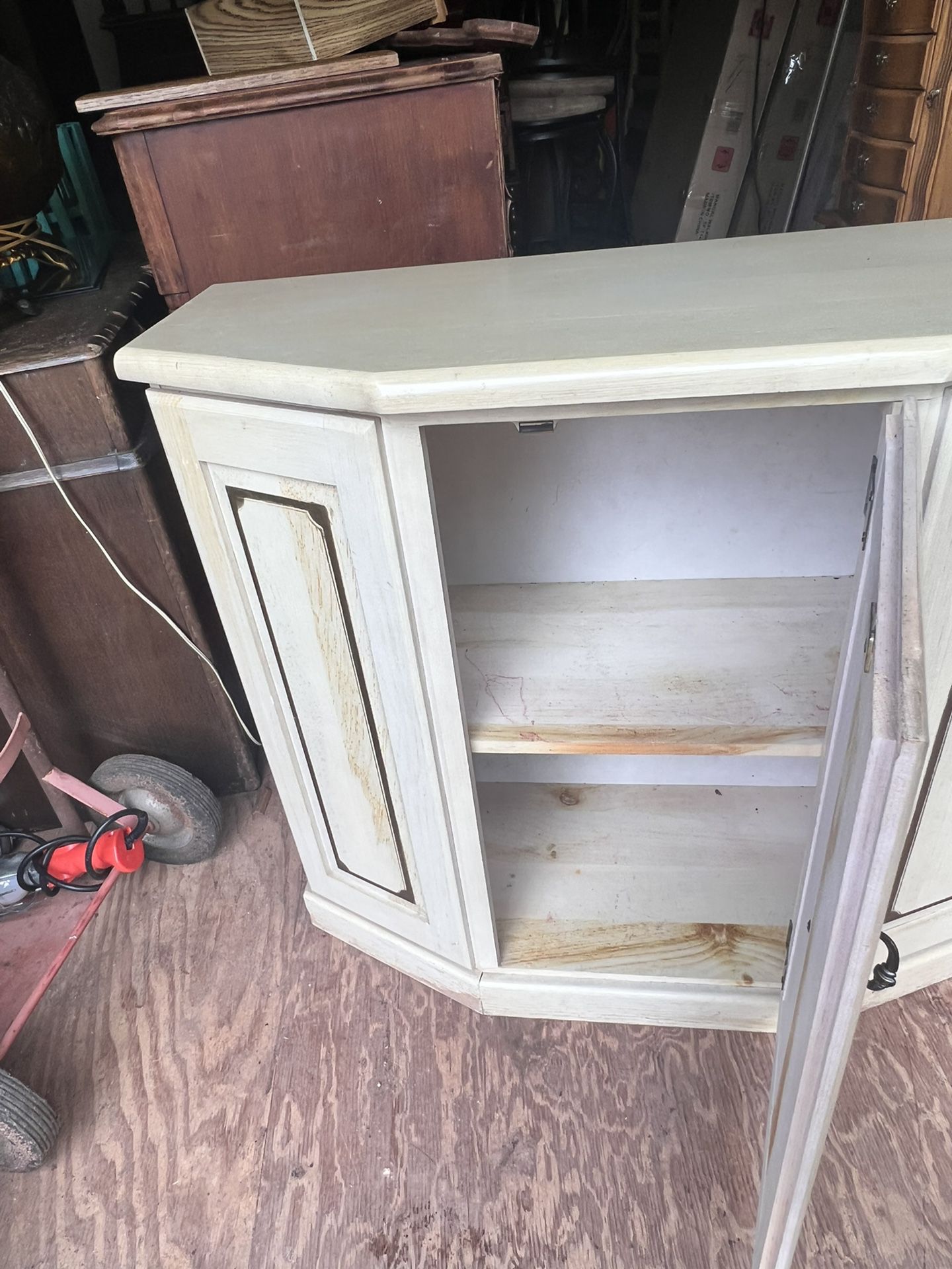 A Pretty Cabinet Its 30 inches  Tall 23 Inches Wide And 13 Inches Deep