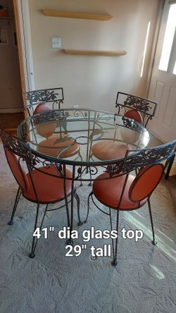 Indoor patio set - glass table with 4 chairs.
