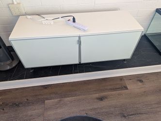 Beautiful TV stand with the storage and very good working condition