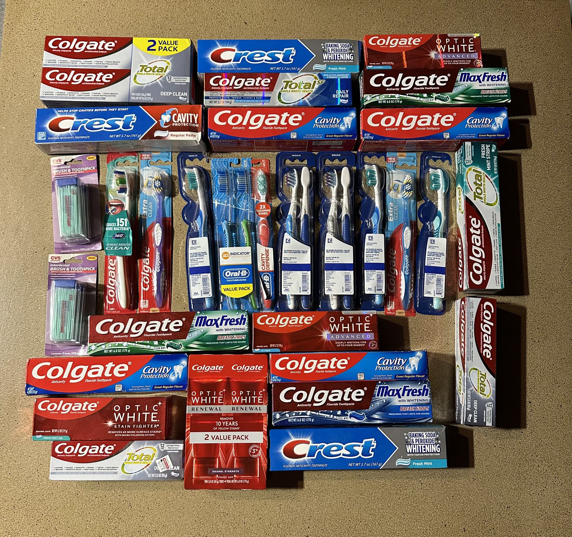 Lot Of Toothpaste And Toothbrushes