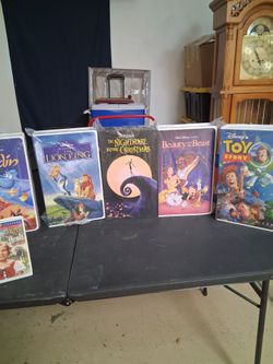 Disney blankets and v h s boxes , asking forty bucks apiece , brand new