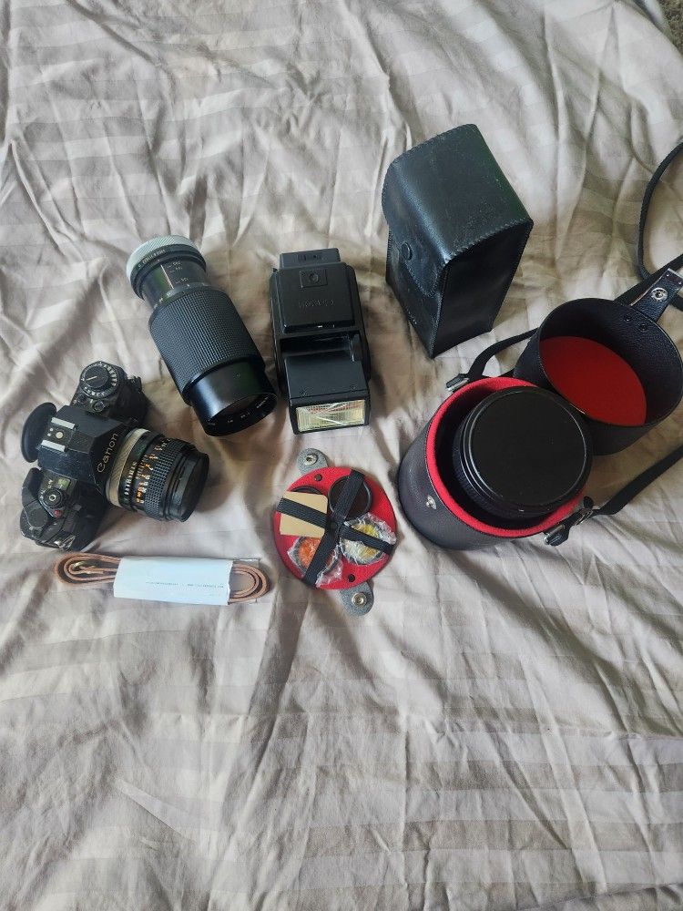 Cannon A1 +2 Lenses, Flash, and Leather Strap