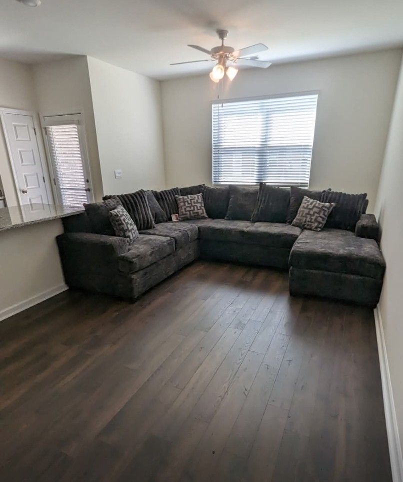 Devin Dark Gray Sectional w Pillows