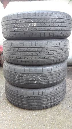 235/65/18 Continental cross contact set of 4 tires 70% tread great condition 250$ for 4 tires .