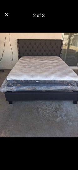 New in box queen bed we deliver