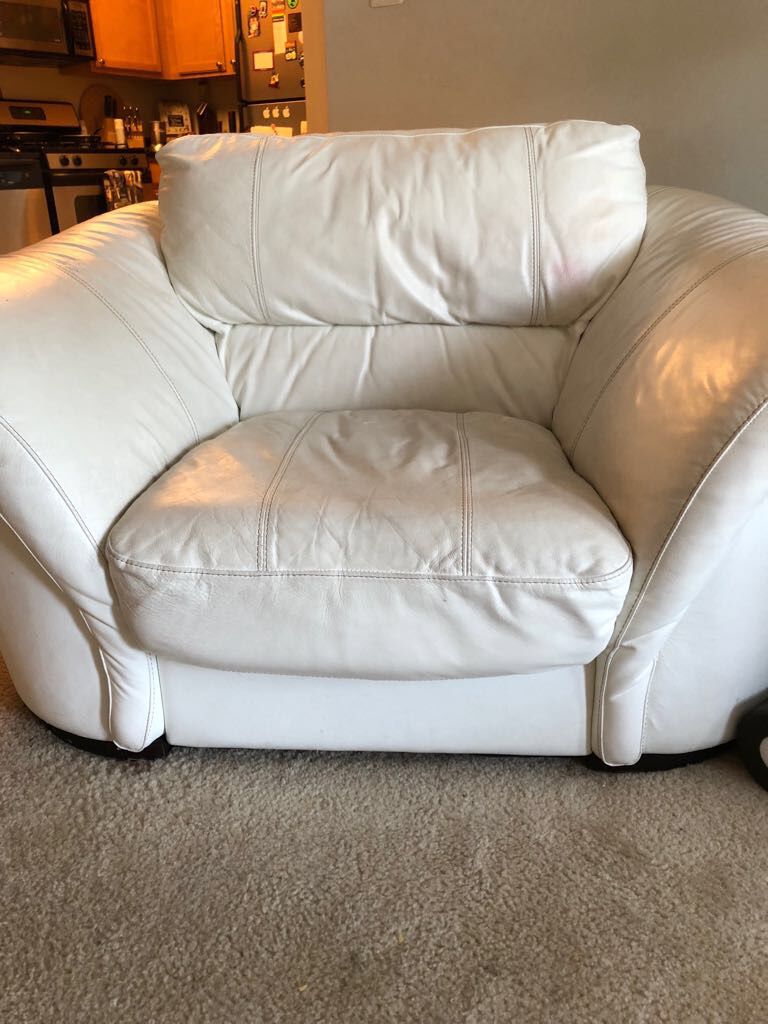 Living room set, white leather couch chair and ataman. Good condition.