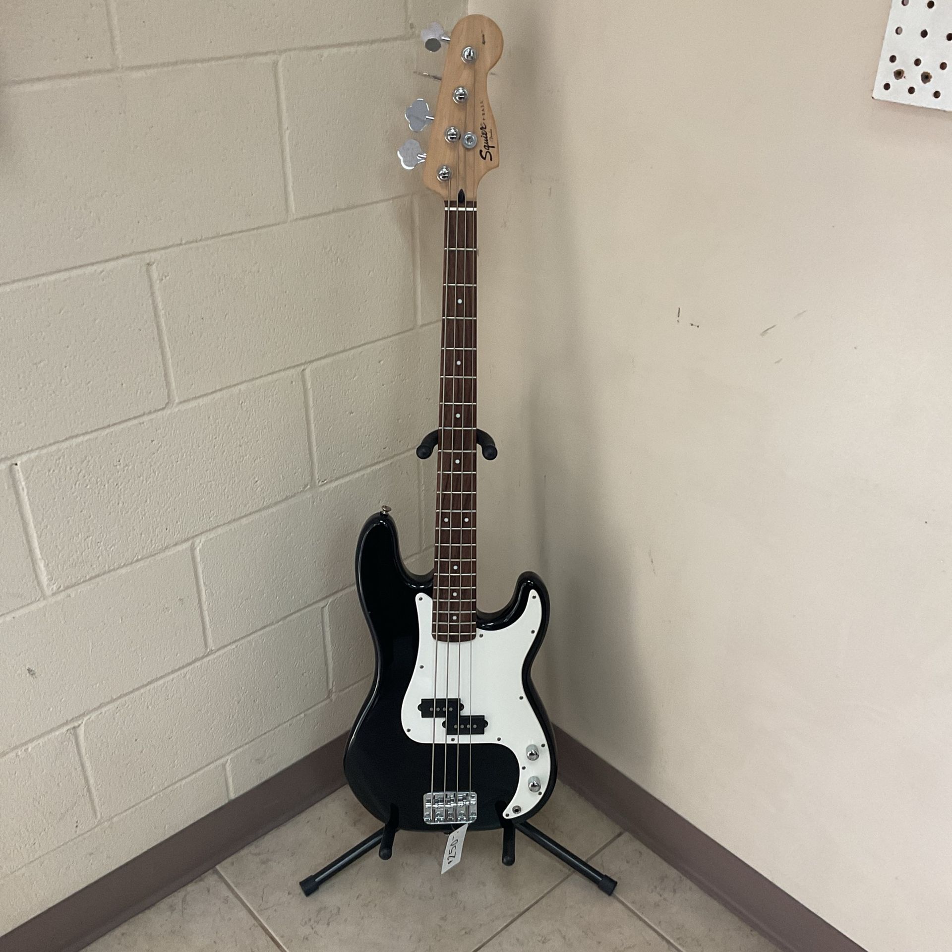SQUIER BY FENDER P-BASS ELECTRIC GUITAR.