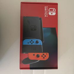 Nintendo Switch Brand New With 2 Games