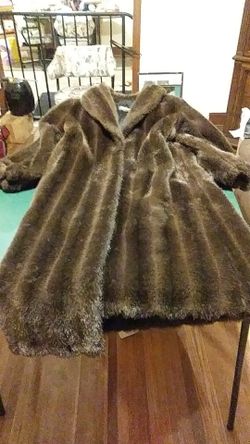 Woman's brown full-length fur coat