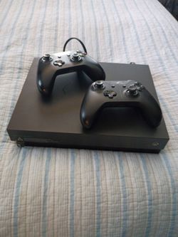 Xbox One X Console with Two Controllers