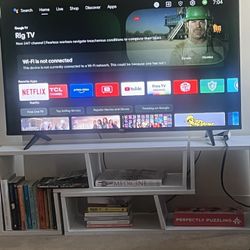  50” TCL Roku Smart TV + White Stand 