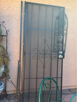 Black metal security door .