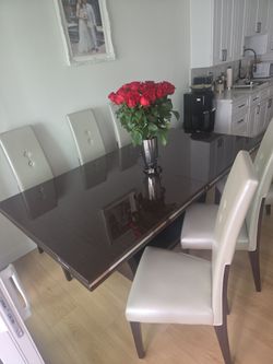 Expendable Dining table with 6 chairs and cabinet