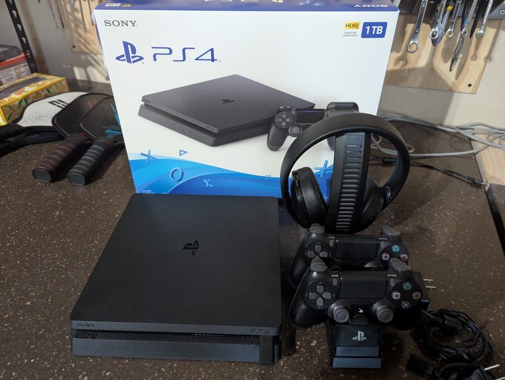 PS4 1TB Black With 5 Games + A Controller Base Charger + PS4 Headphones Combo