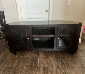 Dark wood tv stand entertainment center