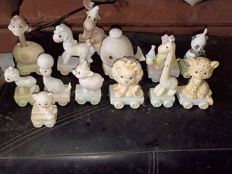 Precious moments figurines. The number for is missing but other than that it's in great condition