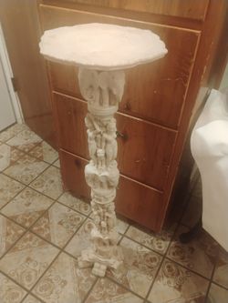 Vtg. Carved table . 3ft. High