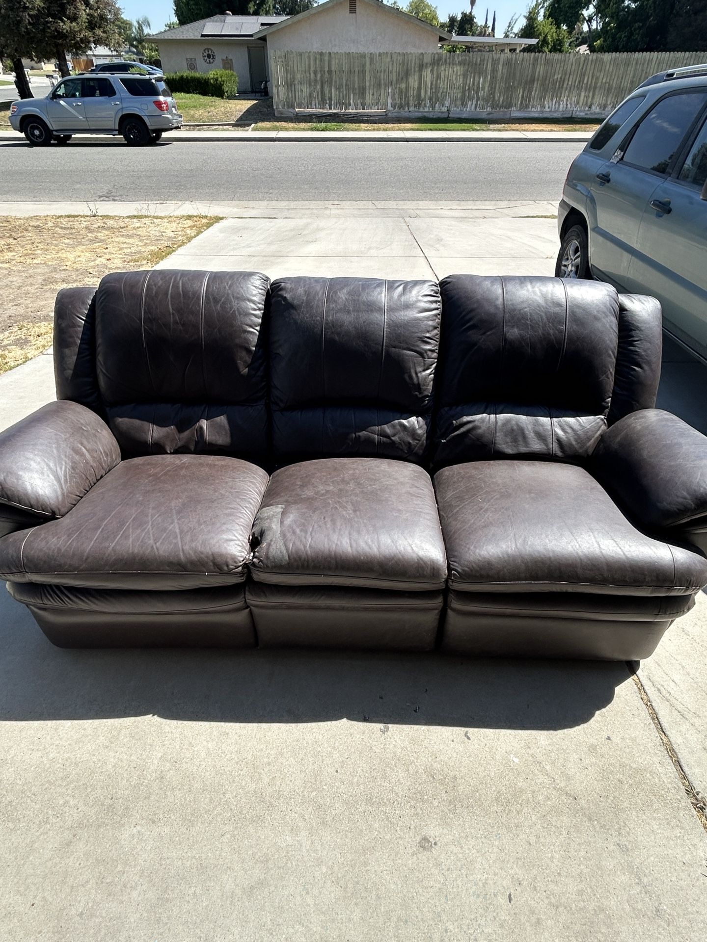 Brown Leather Reclining Coach