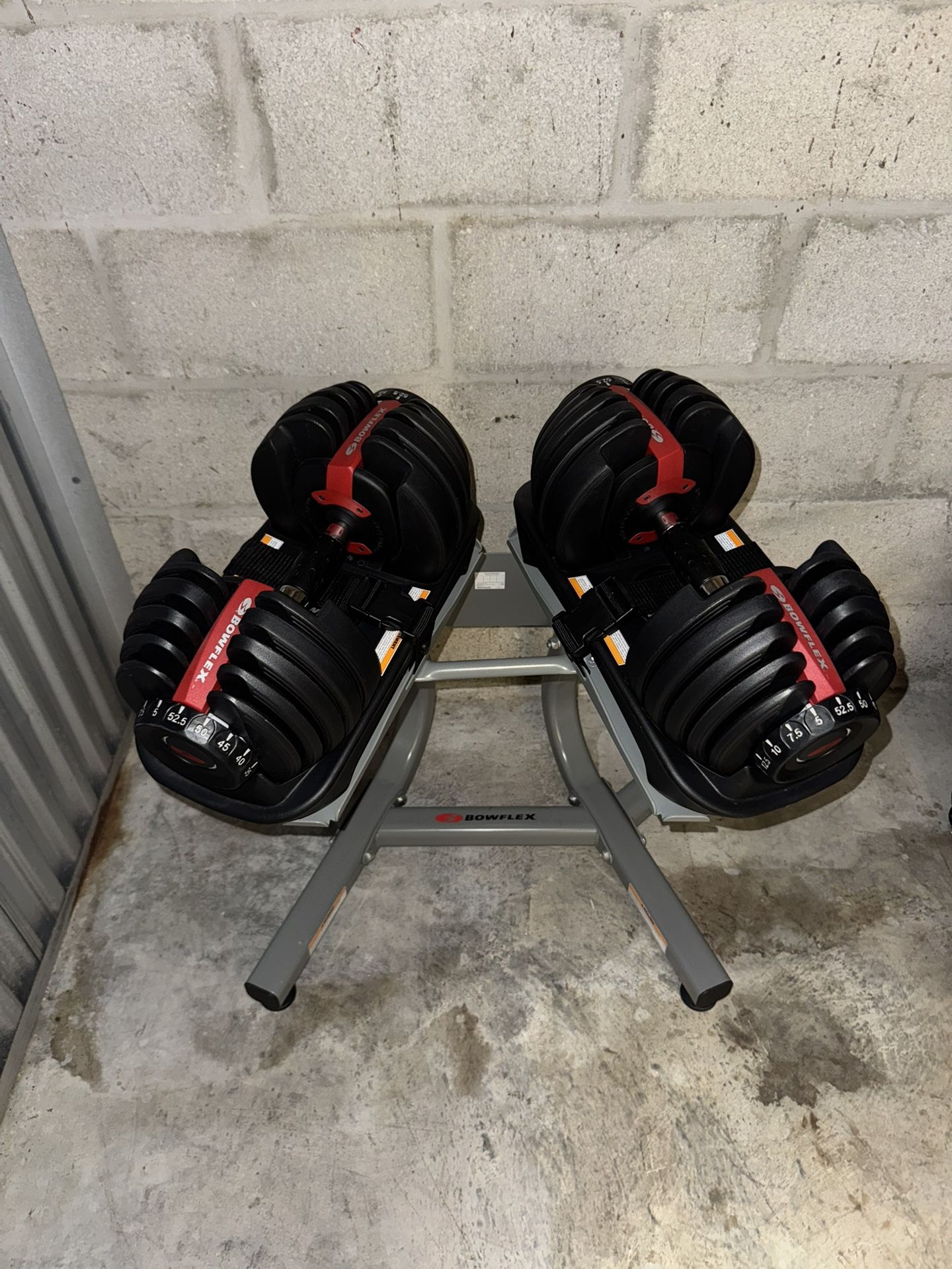 Bowflex Dial Adjustable 52.5 Lb Dumbbells With Stand