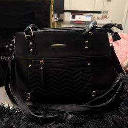 Black chevron shoulder bag with gold accents #goingout