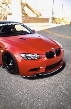 GT4 STYLE CARBON FIBER FRONT LIP W/ AIR HOLES - BMW E9X M3