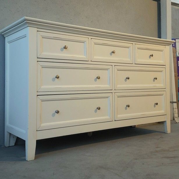 White elegant wooden dresser