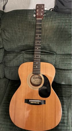 Guitar Acoustic carlos model  205 made in Korea Its a beautiful piece ang Sound.