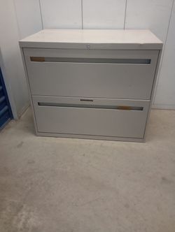 Solid metal file cabinet legal size or letter size paper