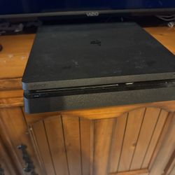 PS4 And 2 Controllers 