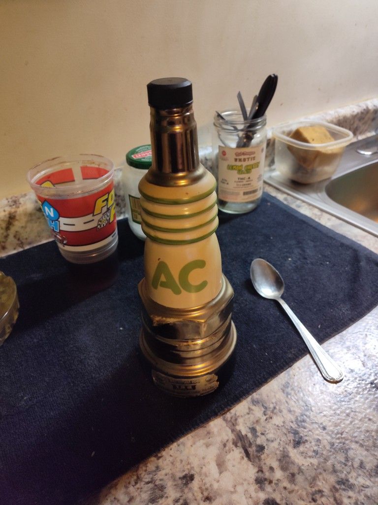 Jim Beam Cloects Spark Plug Bottle Only 100.00