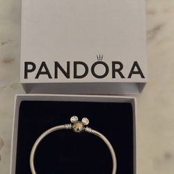 Pandora Mickey Mouse-shaped clasp with a 14k gold circle engraved 