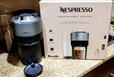 This is a Nespresso Vertuo Pop+ Deluxe coffee and espresso maker