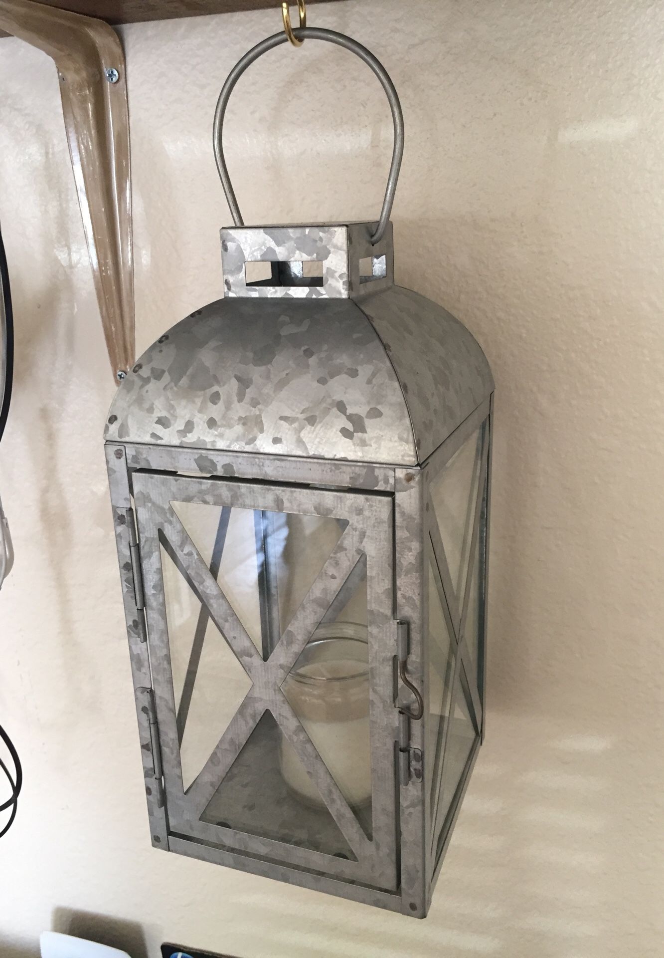 Zinc lantern with candle