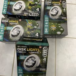 5 sets new sealed box BELL + HOWELL 4 -Pack Swivel Disk Lights 3 -Lumens Stainless steel Solar LED Outdoor Path Light ( 6500-K )$100.00 O.B.O.