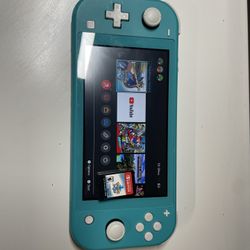 Nintendo Switch Lite Coral With Pokemon Sword 