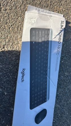 Slim wireless keyboard with mouse and  USB receiver.