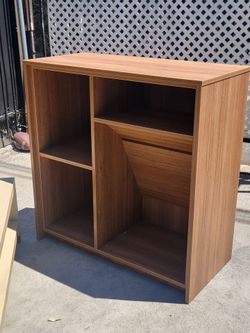 Wood storage cabinet