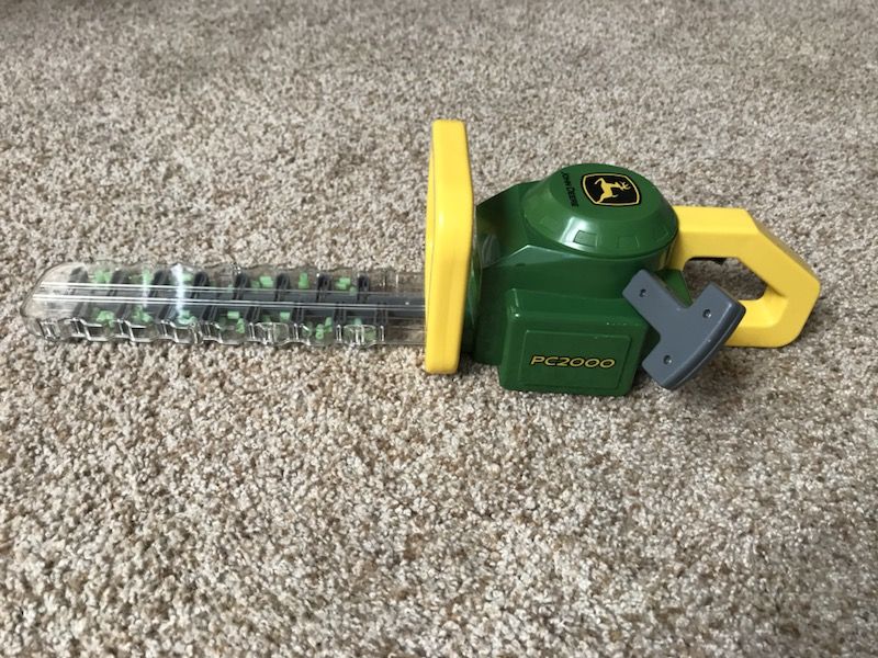 John Deere toy chainsaw