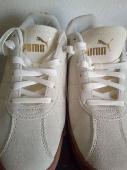 Pumas lowtops (white) size 10
