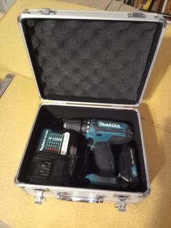Makita drill driver and New charger