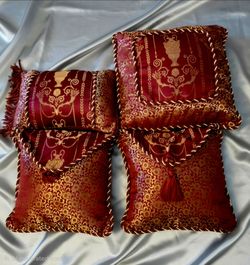 4 vintage burgundy and gold jacquard pillows featuring classic urn, Amphora