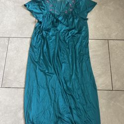 vintage Vanity Fair nightgown in teal with embroidered floral details on the neckline.  It has in front little non visible stains
