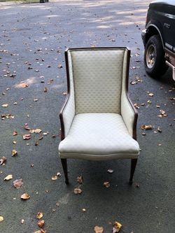 White winged back chair