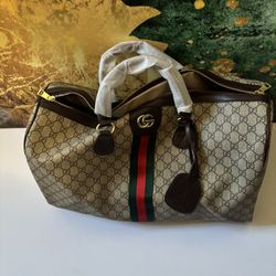 Gucci Duffle Bag. 